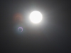 Lens flares show that this is taken during a full eclipse